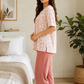 Woman in pink pajama